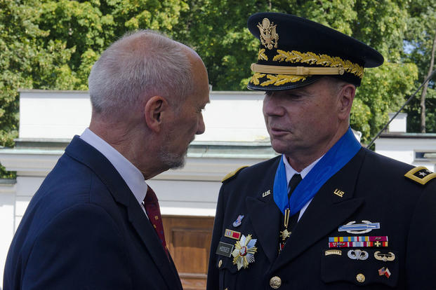 Minister of National Defense, Antoni Macierewicz thanked the Commanding General of U.S. Army Europe, Lt. Gen. Ben Hodges for his service during the 97th anniversary of the Battle of Warsaw Aug. 15, 2017, in Warsaw, Poland. (U.S. Army/Sgt. Justin Geiger)