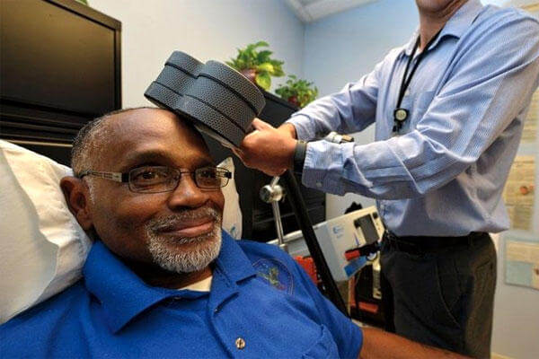 Percy Jones receives rTMS therapy to help treat his depression. (VA photo/James Arrowood)