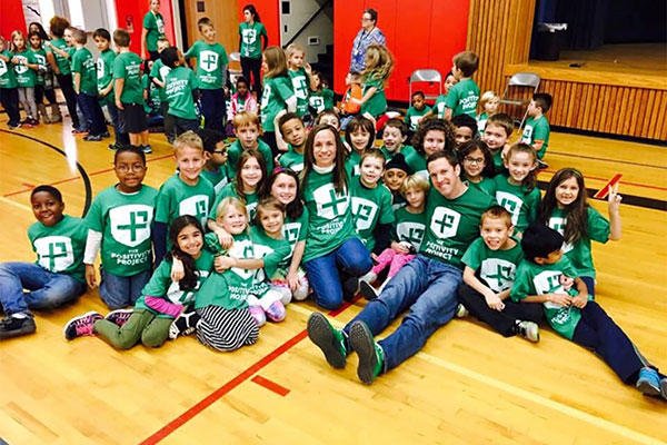 Mike Erwin, founder of the Positivity Project, with elementary school participants