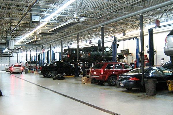 Car dealership garage (Wikipedia photo by Christopher Ziemnowicz)