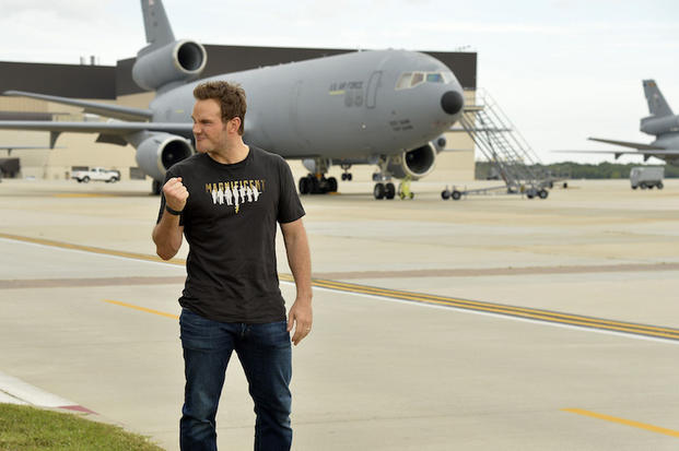 The Magnificent 7  movie actor Chris Pratt gestures as he arrives on the flightline for a press interview prior to a USO-sponsored film premiere at Joint Base McGuire-Dix-Lakehurst, New Jersey, September 18, 2016. The cast members and director toured the flightline, greeted service members and met with military families to extend their appreciation for their service.             USO Photo by Mike Theiler