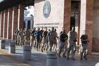 U.S. Marine Corps and other military personnel run during a physical training session outside of the Marine House at the U.S. Embassy, Bamako, Mali, Aug. 29, 2016. (U.S. Marine Corps photo/Staff Sgt. Sarah R. Hickory)