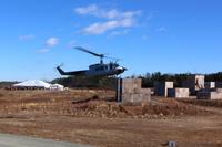 The Marine Corps demonstrated a new type of drone helicopter called the Autonomous Aerial Cargo/Utility System, or AACUS, on Dec. 13, 2017, at Quantico, Va. A backup pilot can be seen in the cockpit. (Military.com photo by Matthew Cox)