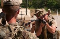 Spc. Wyatt Ritter coaches Ukrainian soldiers during rifle marksmanship training at the Yavoriv Combat Training Center near Yavoriv, Ukraine on July 31, 2017. (U.S. Army Photo/Staff Sgt. Eric McDonough)