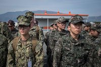 Naval Mobile Construction Battalion 5 Sailors and Republic of Korea (ROK) sailors listen to a safety brief at the ROK Naval Education and Training Command in Jinhae, ROK, March 13, 2017, as part of exercise Foal Eagle 2017. (U.S. Navy photo/Torrey W. Lee)