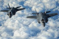 Two Israeli F-35 “Adirs” fly in formation and display the U.S. and Israeli flags after receiving fuel from a Tennessee Air National Guard KC-135, Dec, 6, 2016. (U.S. Air Force photo/Erik D. Anthony)