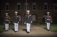 Marines with the Marine Barracks Washington D.C. parade marching staff march down Center Walk during a Friday Evening Parade at Marine Barracks Washington D.C., May 11, 2018. (Marine Corps/Cpl. Robert Knapp)