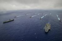 Ship's from the George Washington and Carl Vinson Carrier Strike Groups are underway in formation at the conclusion of Valiant Shield 2014 (U.S. Navy/Mass Communication Specialist 3rd Class Paolo Bayas)