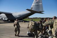 Members of Headquarters Company, 89th Military Police Brigade, Task Force Griffin, get ready to board a C-130J Super Hercules from Little Rock, Ark., at Fort Knox, Ky., in support of Operation Faithful Patriot on Oct. 29, 2018. (U.S. Air Force photo by Airman 1st Class Zoe M. Wockenfuss)