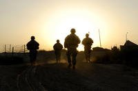 U.S. Army Soldiers of Delta Company, 2nd Battalion, 8th Cavalry, 1st Brigade Combat Team, 1st Cavalry Division, patrol the roads near a tactical checkpoint in Taji, Iraq, Sept. 17, 2007. (Steve Czyz/Army)