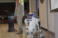 Maj. James Enderby, joined by R2-D2, served as emcee and coordinator for the Materials and Manufacturing Directorate’s Star Wars-themed Safety Down Day, Jan. 2017. (U.S. Air Force photo/David Dixon)