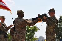 Lt. Gen. Sean MacFarland (right), III Corps and Fort Hood commanding general cases the unit colors during a ceremony outside the corps headquarters at Fort Hood, Texas, Aug. 31, 2015. The ceremony marked III Corps' deployment in support of Operation Inherent Resolve. (U.S. Army/Todd Pruden, Fort Hood Public Affairs)