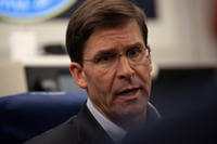 Acting U.S. Secretary of Defense Mark T. Esper speaks to reporters on a government aircraft en route to Brussels, Belgium, June 25, 2019. (DoD photo/Lisa Ferdinando)