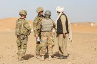 U.S. Army 1st Lt. Jacob Boyle, a platoon leader assigned to 1st Platoon, Company D, 2nd Infantry Brigade Combat Team, 4th Infantry Division, talks to a local national, March 26, 2018, during a ground defense area patrol in Kandahar, Afghanistan. (U.S. Army/Staff Sgt. Neysa Canfield)