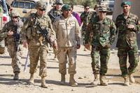 Lt. Col. Zachary Miller, center left, commander of the 1st Security Force Assistance Brigade's 5th Battalion, walks with Afghan military leaders during a clearing operation near Kabul, Afghanistan, Sept. 16, 2018. (Photo Credit: U.S. Army photo by Sean Kimmons)