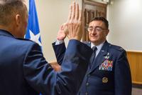 Maj. Gen. Tom Wilcox (left), Air Force Installation and Mission Support Center commander, administers the Oath of Office to Col. Martin Pantaze (right), during a promotion ceremony at Barksdale Air Force Base, Louisiana, September 4, 2019. (U.S. Air Force/Senior Airman Tessa B. Corrick)