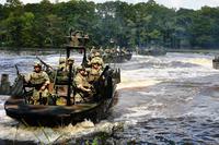 Change of command ceremony utilizing Special Operations Craft Riverine at Stennis Space Center in Mississippi.