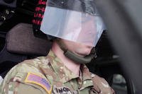 Army pilot wearing a visor