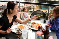 mother with two children at a restaurant