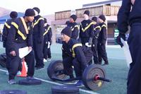 A soldier prepares to lift the hex bar for the 3 Repetition Maximum Deadlift event at Fort Irwin.