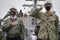 Kenneth J. Braithwaite and Cmdr. Rob Niemeyer.