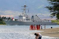 The guided-missile destroyer USS Pickney leaves Pearl Harbor.