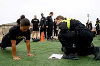 A female soldier performs the ACFT