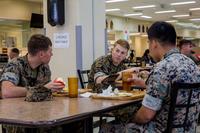 U.S. Marines practice social distancing while eating at the Camp Hansen Mess Hall at Camp Hansen.
