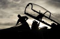 An airman prepares an F-15E Strike Eagle for takeoff.