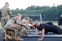 Soldiers perform push-ups as part of Army Physical Fitness Test