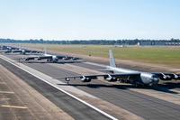 B-52H Stratofortresses line up on the runway.