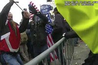 Thomas Webster at a barricade line at on the west front of the U.S. Capitol on Jan. 6, 2021.