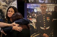Families of Marines who died in amphibious assault vehicle accident.