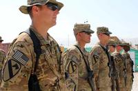 Soldiers from the 1st Cavalry Division, stand in formation