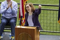 Oregon Gov. Kate Brown pumps her fist.
