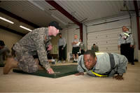 Army reservist performs push-ups.
