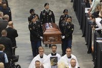 remains of Father Emil during Kapaun's funeral Mass