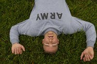 Military police officer recovers after a two-mile run.