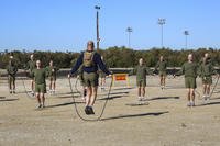 Marine recruits jump rope