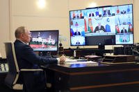 Russian President Vladimir Putin takes part in a virtual Summit