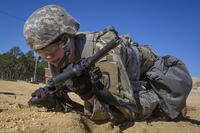 National Guardsman performs a high crawl.