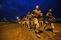 Marines go on a formation run.