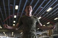 U.S. Marine Corps Cpl. James Dunn jumps rope during physical training aboard the USS Bataan.