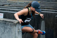 An ROTC cadet stretches during a 5K run.