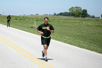 A soldier runs a two-mile route during an Army physical fitness test.