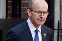 Jeremy Fleming, head of the British Government Communications Headquarters (GCHQ) walks in London.