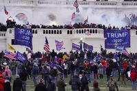 Rioters supporting President Donald Trump storm the Capitol.