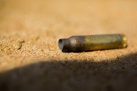 A 5.56mm cartridge after being fired from an M4 carbine rifle