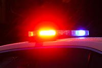 Philadelphia police car with flashing lights.