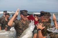 U.S. Marine Corps Cpl. Courtland Mabe, an anti-tank missile gunner with 2d Light Armored Reconnaissance Battalion, 2d Marine Division, recites the Oath of Enlistment on Camp Lejeune, North Carolina.